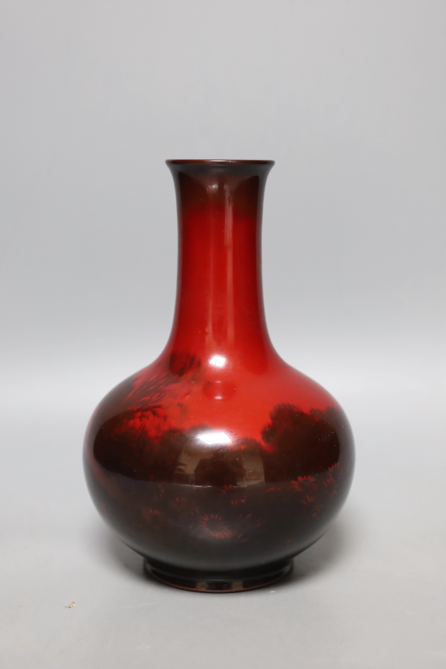 A Royal Doulton flambe vase - 21cm tall